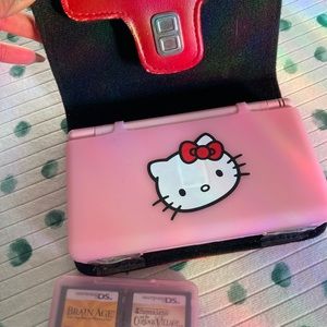 Pink DS with hello kitty case and cover (games included)